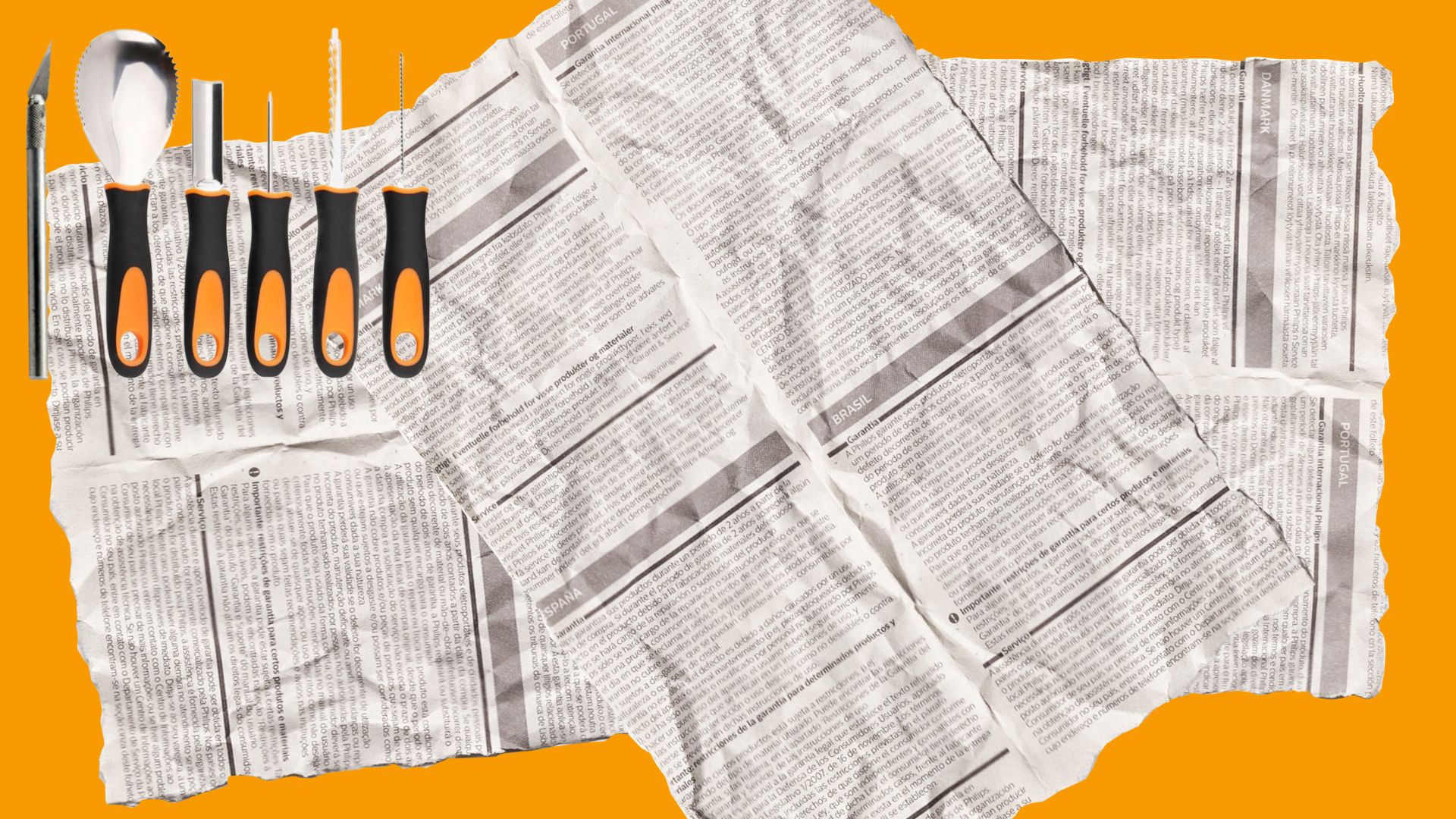 Prep the area for pumpkin carving. Orange background covered in newspaper and lined up pumpkin carving tools